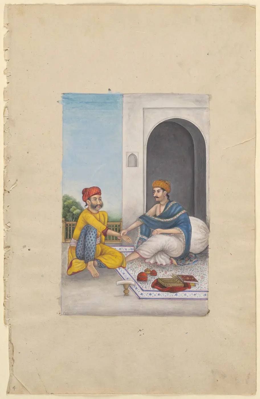 An Ayurvedic practitioner taking a patient’s pulse